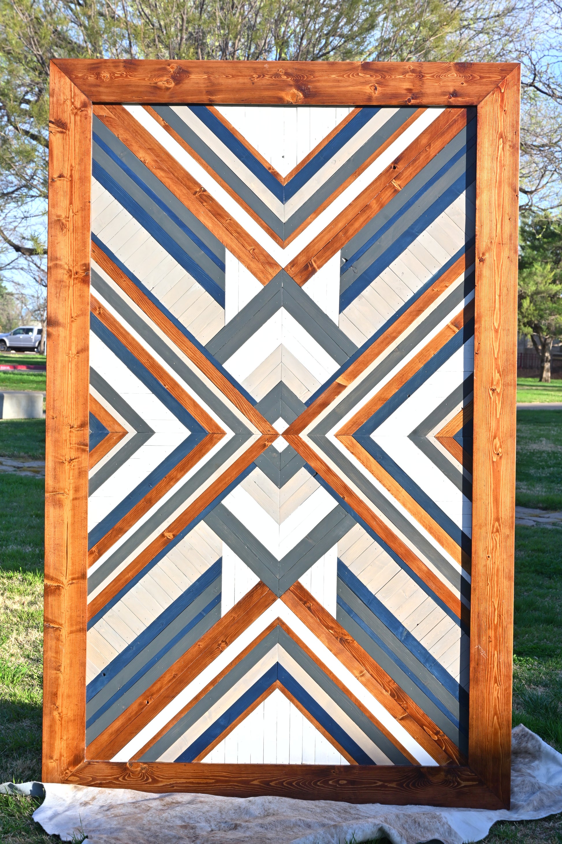 custom sliding barn door bold geometric pattern navy charcoal and natural wood tones made to order