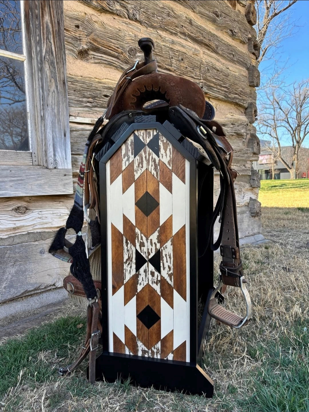 custom handcrafted Western wood saddle rack bold geometric side panel dark stain holding full Western saddle