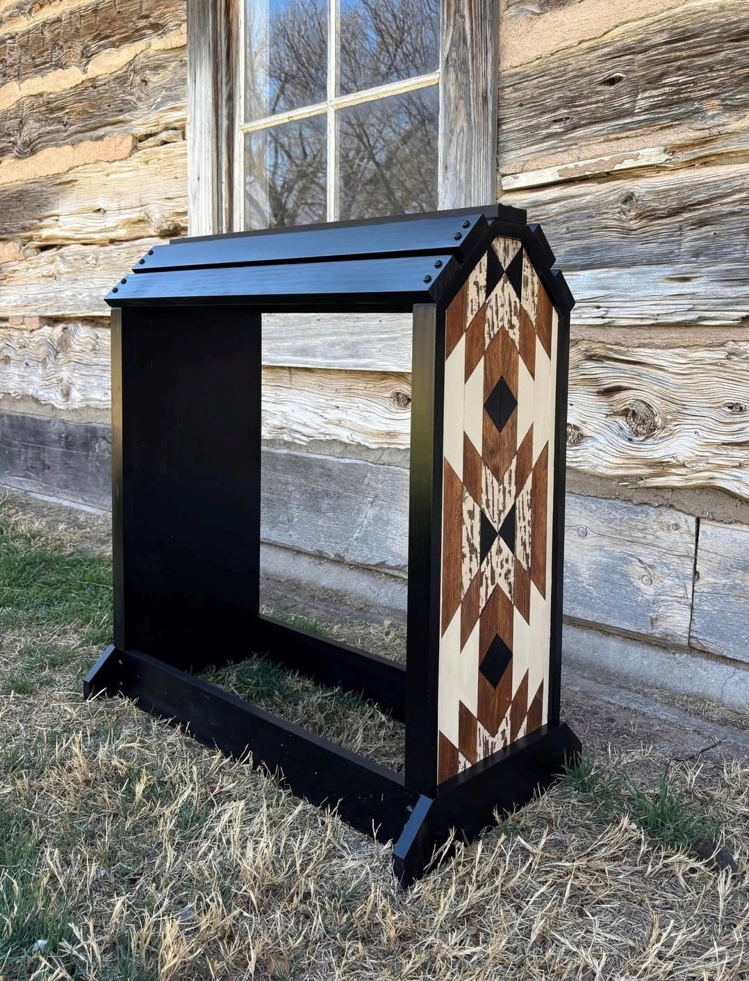 custom Western wood saddle rack empty showing arched top solid black frame geometric side panel handmade to order