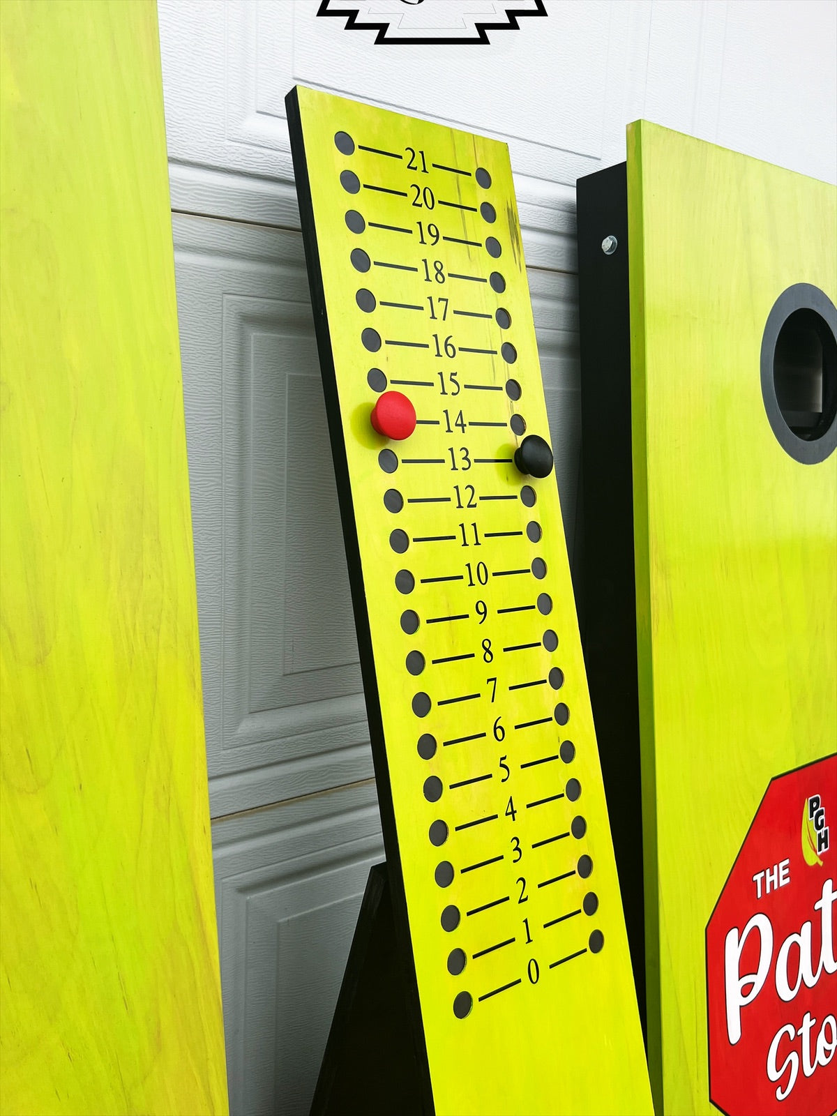 personalized cornhole scoreboard detail shot custom colored pegs made to order