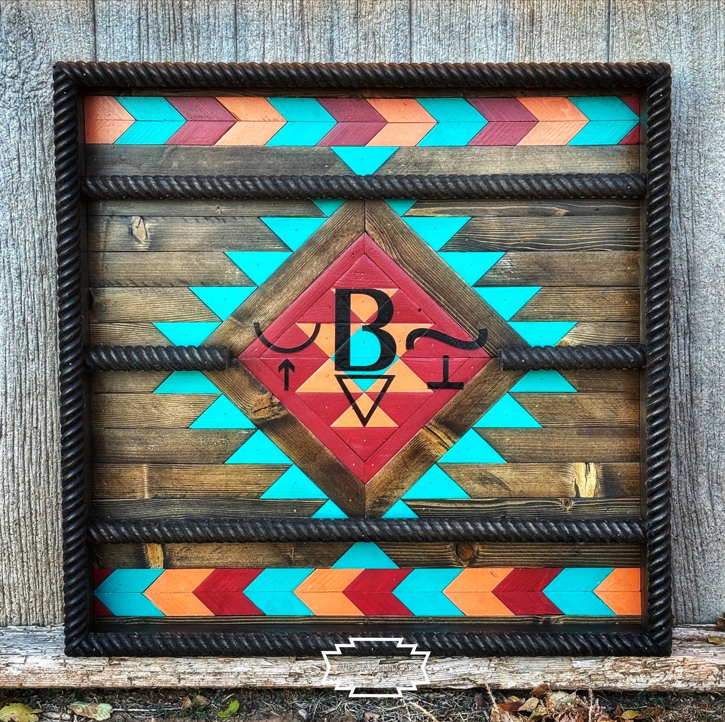 personalized rodeo buckle display case with ranch brand and initials painted geometric Southwestern